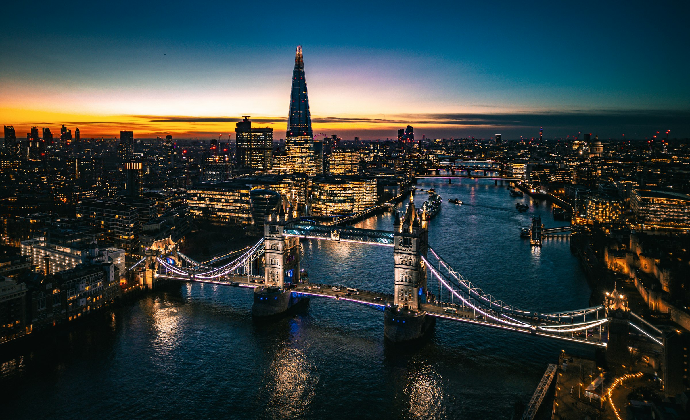 Tower Bridge and the Shard over the River Thames in London at dusk